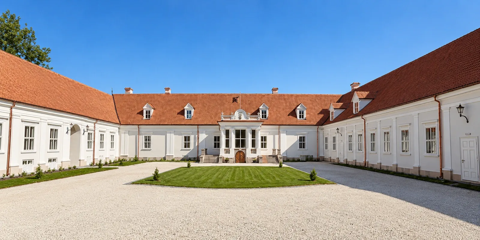 The restored castle and courtyard in daylight