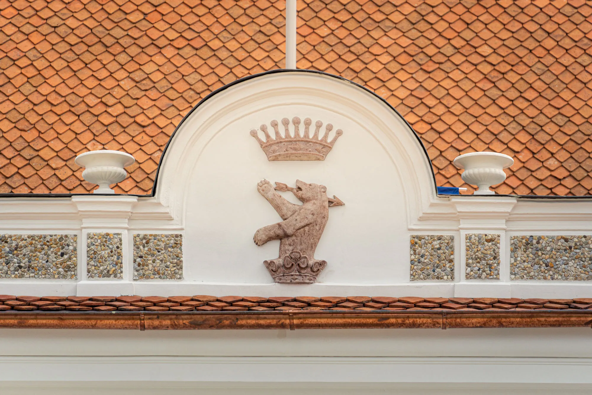 Carved crest above the castle façade