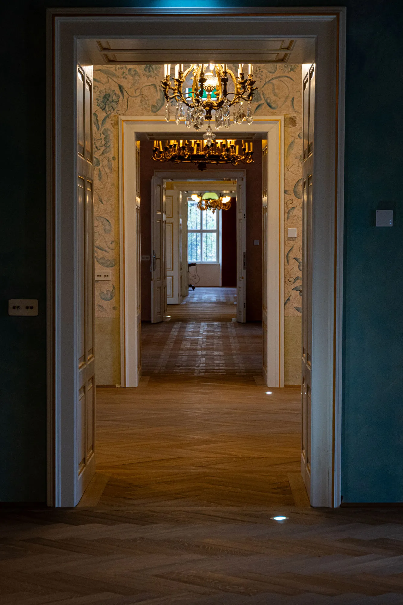 A sequence of decorated interior doorways