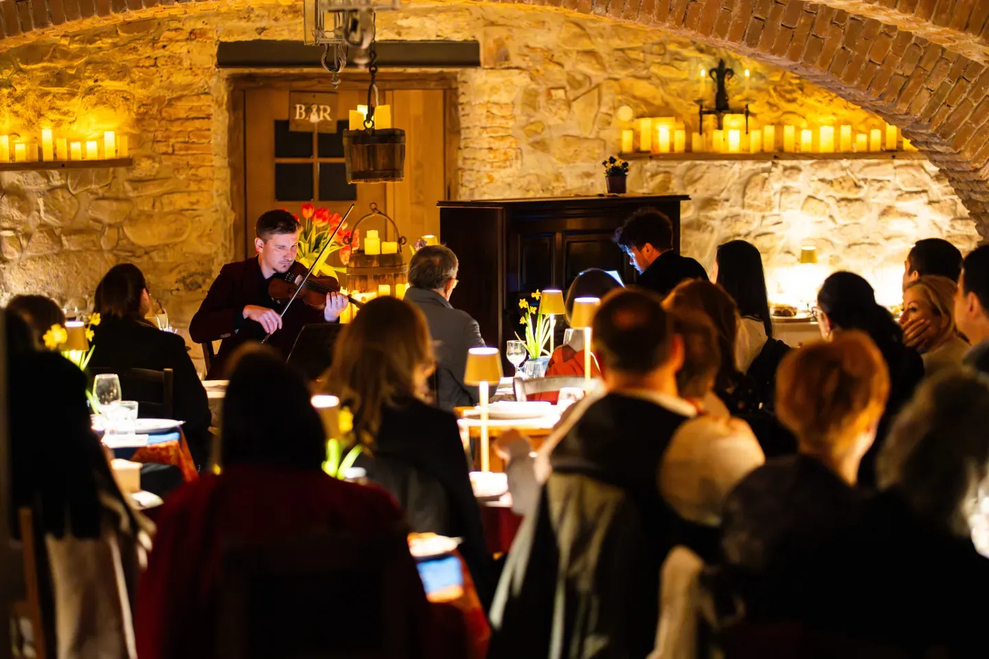Audience listening to the Spring Stories opening concert on 8 March 2026 in the Kálnoky Castle wine cellar